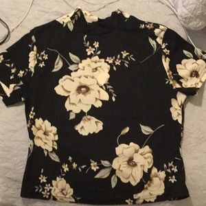 Black, floral top.